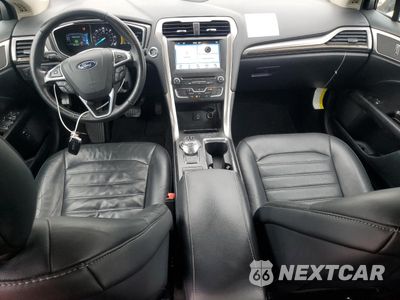 Zdjęcie 8 z 12 samochodu: 2017 FORD FUSION SE HYBRID VIN:3FA6P0LU9HR409636 - miniatura