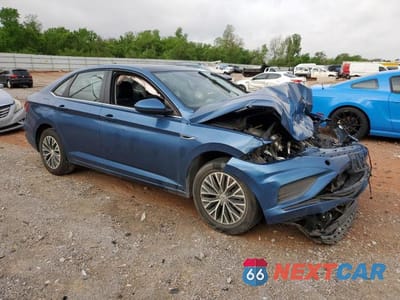 Czwarte zdjęcie samochodu z boku: 2019 VOLKSWAGEN JETTA SEL VIN:3VWE57BU2KM096534 - miniatura