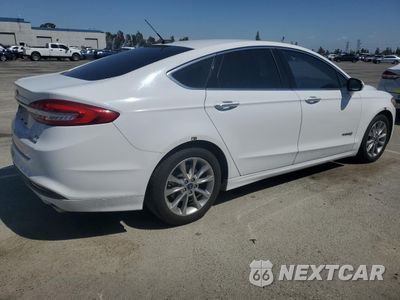 Trzecie zdjęcie samochodu z tyłu: 2017 FORD FUSION SE HYBRID VIN:3FA6P0LU9HR409166 - miniatura