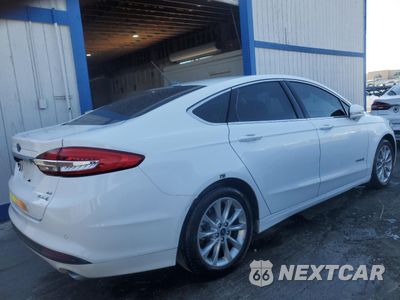 Trzecie zdjęcie samochodu z tyłu: 2017 FORD FUSION SE HYBRID VIN:3FA6P0LU5HR408970 - miniatura