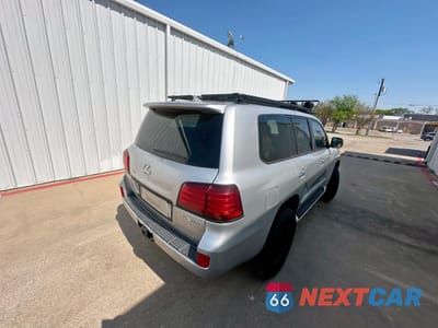 Czwarte zdjęcie samochodu z boku: 2011 LEXUS LX 570 VIN:JTJHY7AXXB4076317 - miniatura