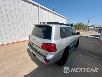 Czwarte zdjęcie samochodu z boku: 2011 LEXUS LX 570 VIN:JTJHY7AXXB4076317 - miniatura