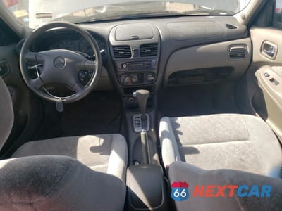 Zdjęcie 8 z 13 samochodu: 2002 NISSAN SENTRA XE VIN:3N1CB51D72L597758 - miniatura