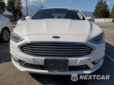 Piąte zdjęcie samochodu w środku: 2017 FORD FUSION SE HYBRID VIN:3FA6P0LU1HR400736 - miniatura