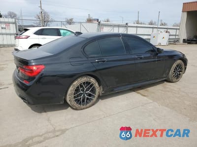 Trzecie zdjęcie samochodu z tyłu: 2018 BMW 750 XI VIN:WBA7B0C59JG527248 - miniatura