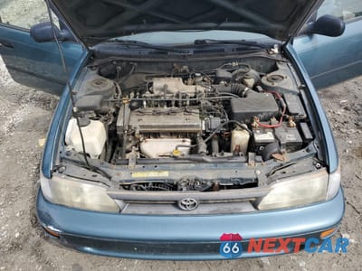 Zdjęcie 11 z 12 samochodu: 1994 TOYOTA COROLLA LE VIN:1NXAE09B0SZ297630 - miniatura