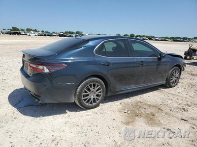 Trzecie zdjęcie samochodu z tyłu: 2021 TOYOTA CAMRY SE VIN:4T1G11AK0MU428968 - miniatura