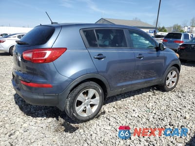 Trzecie zdjęcie samochodu z tyłu: 2012 KIA SPORTAGE BASE VIN:KNDPB3A28C7250477 - miniatura