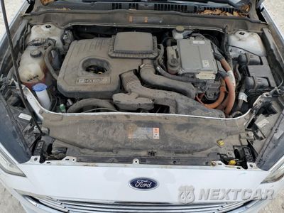 Zdjęcie 11 z 12 samochodu: 2018 FORD FUSION SE HYBRID VIN:3FA6P0LU3JR129796 - miniatura