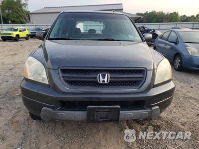 Piąte zdjęcie samochodu w środku: 2004 HONDA PILOT EXL VIN:2HKYF18544H572012 - miniatura