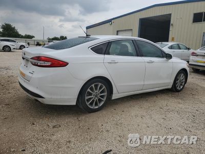 Trzecie zdjęcie samochodu z tyłu: 2017 FORD FUSION SE HYBRID VIN:3FA6P0LUXHR409385 - miniatura