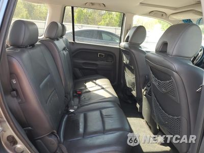 Zdjęcie 12 z 14 samochodu: 2006 HONDA PILOT EX VIN:2HKYF185X6H545822 - miniatura
