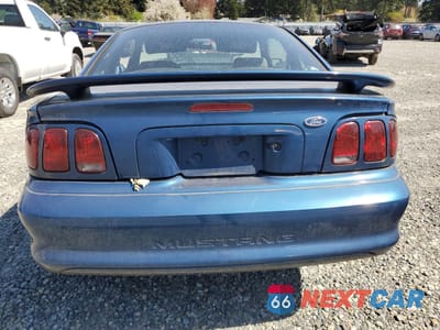 Zdjęcie 6 z 12 samochodu: 1998 FORD MUSTANG VIN:1FAFP4040WF195576 - miniatura