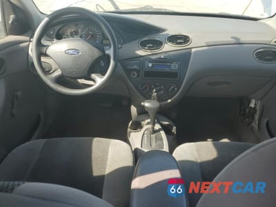 Zdjęcie 8 z 14 samochodu: 2003 FORD FOCUS LX VIN:1FAFP33P23W311601 - miniatura