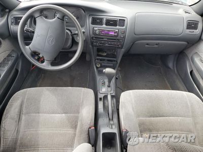Zdjęcie 8 z 12 samochodu: 1994 TOYOTA COROLLA LE VIN:1NXAE09B0SZ297630 - miniatura