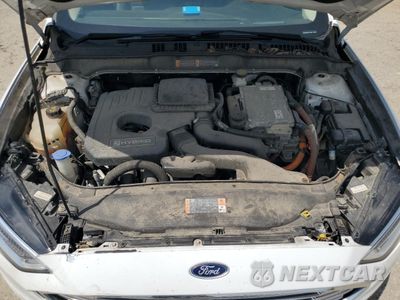 Zdjęcie 11 z 12 samochodu: 2018 FORD FUSION SE HYBRID VIN:3FA6P0LU9JR118690 - miniatura