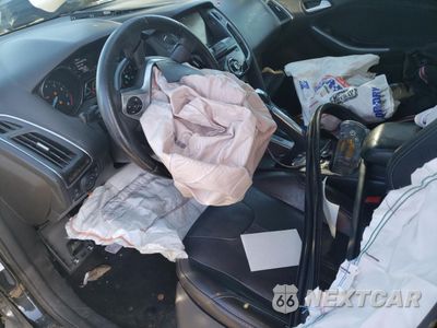 Zdjęcie 7 z 12 samochodu: 2013 FORD FOCUS TITANIUM VIN:1FADP3N26DL269977 - miniatura