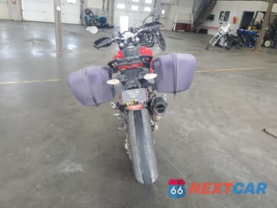 Czwarte zdjęcie samochodu z boku: 2013 DUCATI HYPERMOTARD HYPERSTRADA VIN:ZDM1YBTS6DB002162 - miniatura