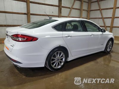 Trzecie zdjęcie samochodu z tyłu: 2017 FORD FUSION SE HYBRID VIN:3FA6P0LU4HR359647 - miniatura