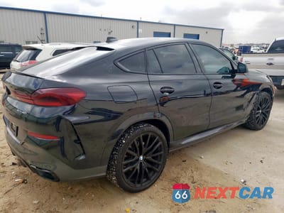 Trzecie zdjęcie samochodu z tyłu: 2022 BMW X6 XDRIVE40I VIN:5UXCY6C05N9K57192 - miniatura