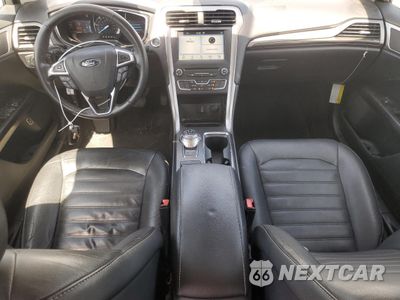 Zdjęcie 8 z 12 samochodu: 2017 FORD FUSION SE HYBRID VIN:3FA6P0LU7HR408890 - miniatura