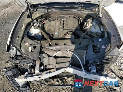 Zdjęcie 11 z 13 samochodu: 2014 BMW 740 I VIN:WBAYA6C58ED144242 - miniatura