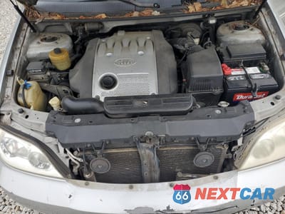 Zdjęcie 12 z 13 samochodu: 2004 KIA SEDONA EX VIN:KNDUP131546542978 - miniatura