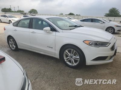 Czwarte zdjęcie samochodu z boku: 2018 FORD FUSION SE HYBRID VIN:3FA6P0LU7JR129963 - miniatura