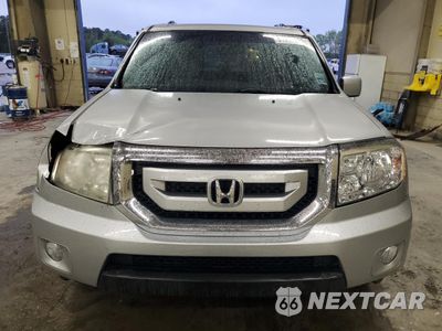 Piąte zdjęcie samochodu w środku: 2011 HONDA PILOT EX VIN:5FNYF3H48BB010337 - miniatura