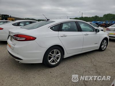 Trzecie zdjęcie samochodu z tyłu: 2018 FORD FUSION SE HYBRID VIN:3FA6P0LU9JR171955 - miniatura