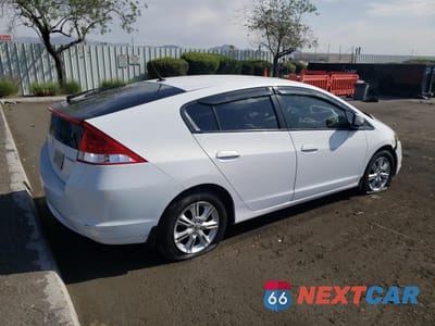 Trzecie zdjęcie samochodu z tyłu: 2010 HONDA INSIGHT EX VIN:JHMZE2H75AS007066 - miniatura