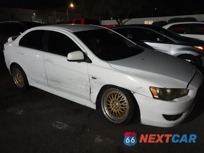 Czwarte zdjęcie samochodu z boku: 2012 MITSUBISHI LANCER ES/ES SPORT VIN:JA32U2FU7CU007655 - miniatura