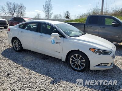 Czwarte zdjęcie samochodu z boku: 2017 FORD FUSION SE HYBRID VIN:3FA6P0LU6HR410114 - miniatura