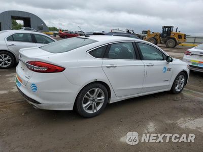 Trzecie zdjęcie samochodu z tyłu: 2018 FORD FUSION SE HYBRID VIN:3FA6P0LU2JR171845 - miniatura