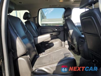Zdjęcie 11 z 13 samochodu: 2010 GMC YUKON XL DENALI VIN:1GKUKMEF1AR279363 - miniatura