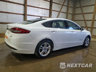 Trzecie zdjęcie samochodu z tyłu: 2018 FORD FUSION SE HYBRID VIN:3FA6P0LU4JR171720 - miniatura