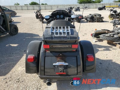 Czwarte zdjęcie samochodu z boku: 2012 HARLEY-DAVIDSON FLHTCUTG TRI GLIDE ULTRA CLASSIC VIN:1HD1MAM17CB853049 - miniatura