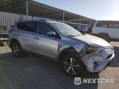 Czwarte zdjęcie samochodu z boku: 2016 TOYOTA RAV4 XLE VIN:2T3WFREV8GW270049 - miniatura