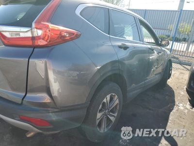 Trzecie zdjęcie samochodu z tyłu: 2018 HONDA CR-V LX VIN:2HKRW5H3XJH422525 - miniatura