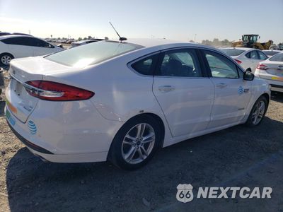 Trzecie zdjęcie samochodu z tyłu: 2018 FORD FUSION SE HYBRID VIN:3FA6P0LUXJR129827 - miniatura