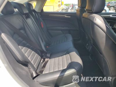 Zdjęcie 10 z 12 samochodu: 2017 FORD FUSION SE HYBRID VIN:3FA6P0LU4HR409723 - miniatura