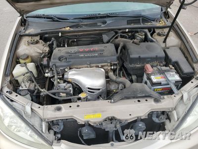 Zdjęcie 13 z 14 samochodu: 2002 TOYOTA CAMRY LE VIN:4T1BE32K12U058765 - miniatura
