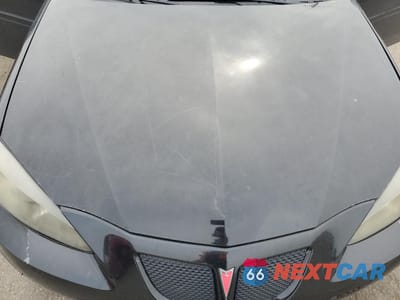 Zdjęcie 12 z 14 samochodu: 2004 PONTIAC GRAND PRIX GT2 VIN:2G2WS522741148130 - miniatura