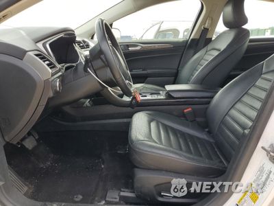 Zdjęcie 7 z 13 samochodu: 2018 FORD FUSION SE HYBRID VIN:3FA6P0LU4JR129872 - miniatura