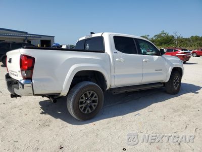 Trzecie zdjęcie samochodu z tyłu: 2023 TOYOTA TACOMA DOUBLE CAB VIN:3TMAZ5CN3PM212056 - miniatura