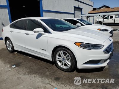 Czwarte zdjęcie samochodu z boku: 2018 FORD FUSION SE HYBRID VIN:3FA6P0LU2JR171599 - miniatura