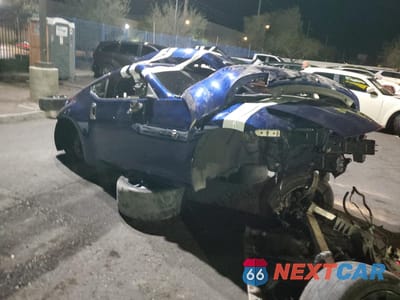 Czwarte zdjęcie samochodu z boku: 2019 NISSAN 370Z BASE VIN:JN1AZ4EH9KM420936 - miniatura