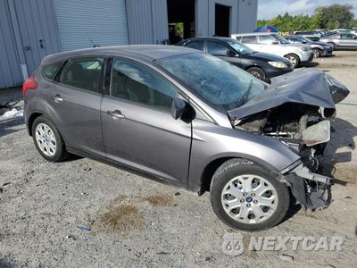 Czwarte zdjęcie samochodu z boku: 2012 FORD FOCUS SE VIN:1FAHP3K24CL182681 - miniatura