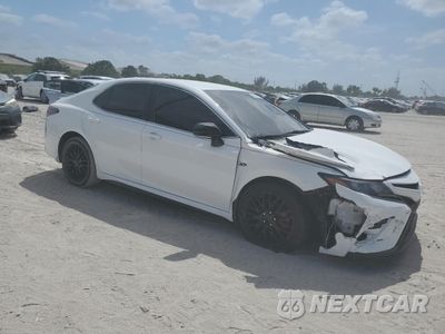 Czwarte zdjęcie samochodu z boku: 2024 TOYOTA CAMRY SE NIGHT SHADE VIN:4T1T11AK1RU843612 - miniatura