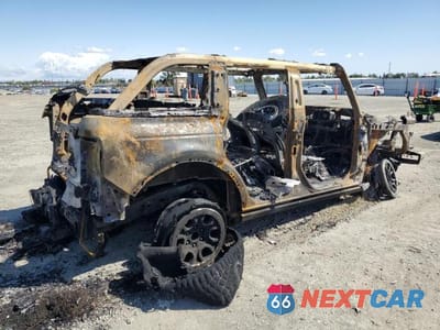 Trzecie zdjęcie samochodu z tyłu: 2022 FORD BRONCO BASE VIN:1FMEE5DP9NLB36527 - miniatura